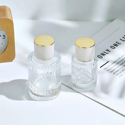 Frascos de vidrio para perfume con pulveridaor y tapa azul 50 ml