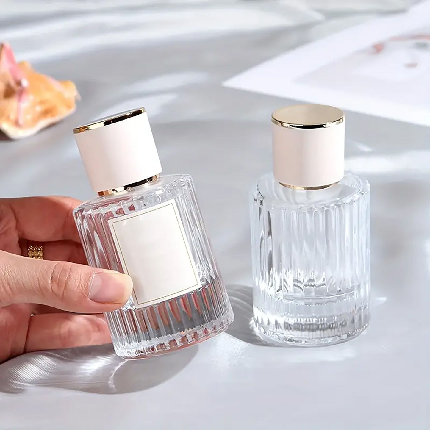 Frascos de vidrio para perfume con pulveridaor y tapa azul 50 ml