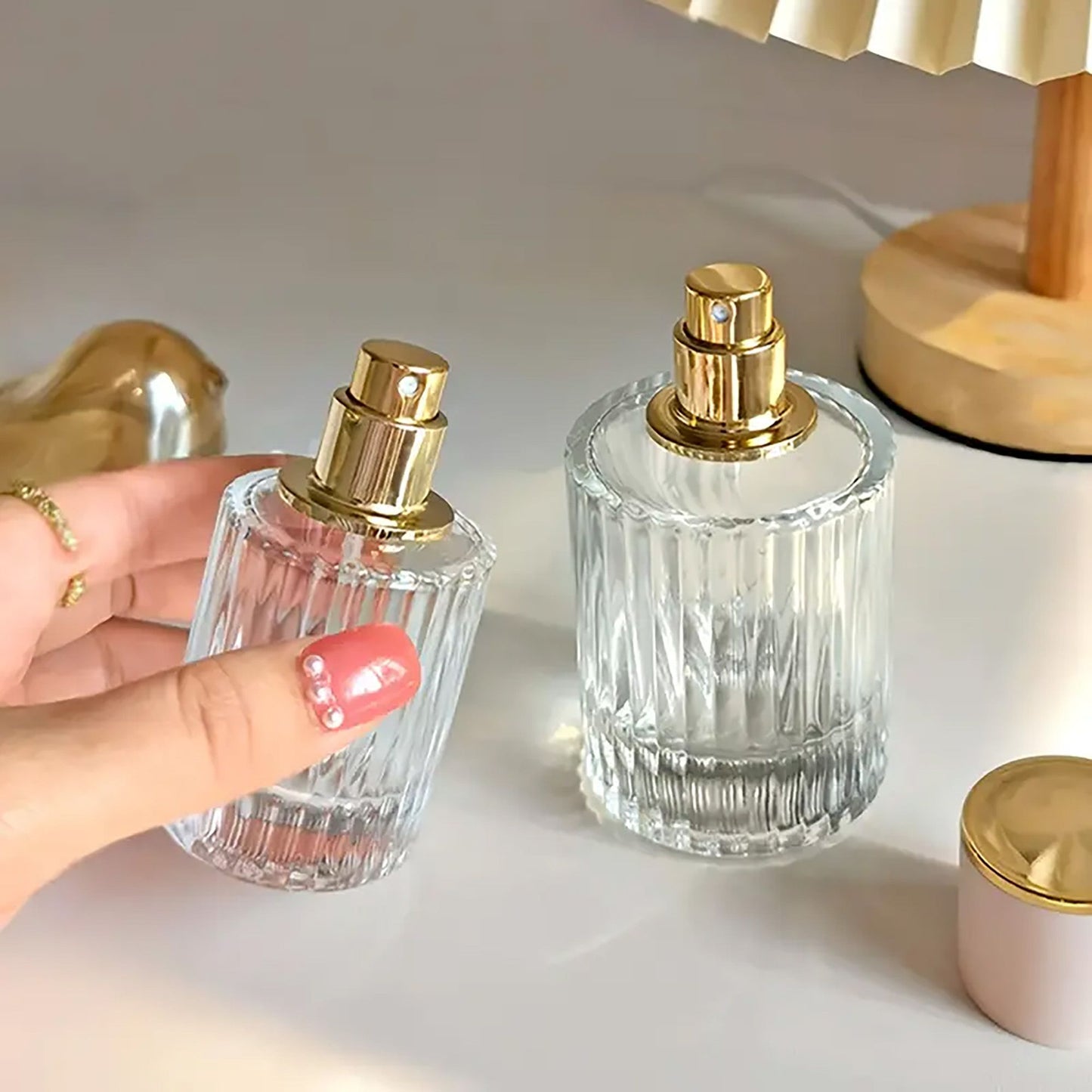 Frascos de vidrio para perfume con pulveridaor y tapa azul 50 ml